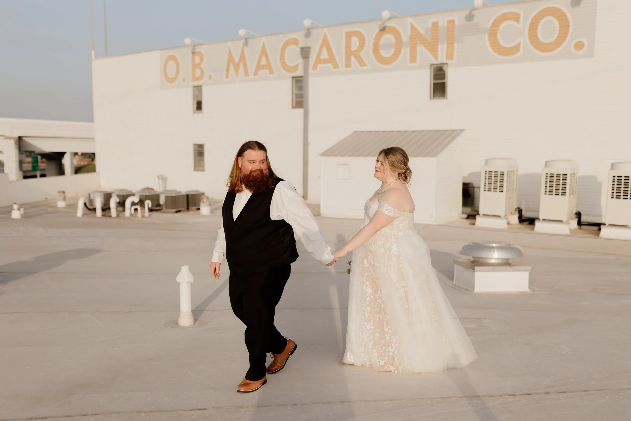 Warm cinematic wedding portraits during golden hour photographed by a Dallas wedding photographer.